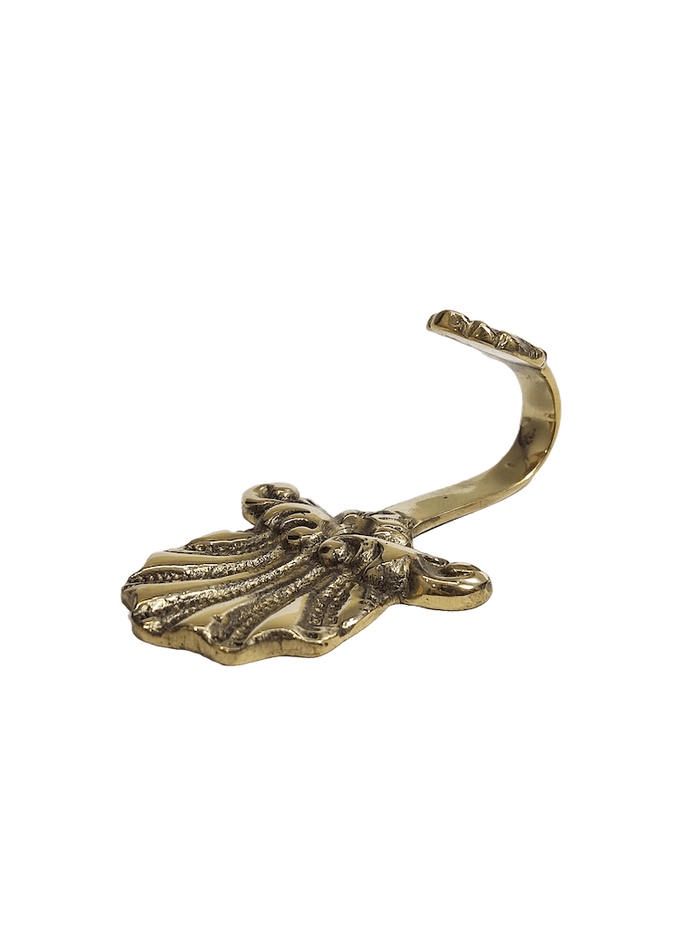Peacock-shaped brass hook with decorative detail